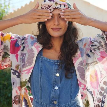 How to style a kimono: Your modern summer style inspo. Woman wearing a One Hundred Stars kimono and headband with a denim playsuit.